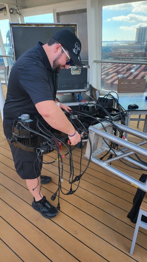 men setting up lights