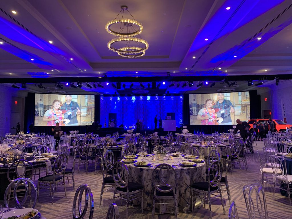 For lighting, we positioned several movers throughout the room in addition to plenty of up-lighting for the drape and fixtures for themed gobos.